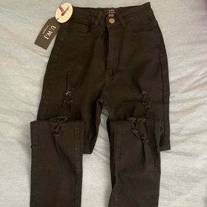 High waisted rip jeans. Size 9/10